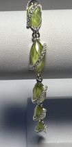 Bracelet Avon Lime Green Glass Oval Beads Crossed Silver Band Fold Over Clasp - £9.03 GBP