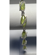 Bracelet Avon Lime Green Glass Oval Beads Crossed Silver Band Fold Over ... - £8.88 GBP