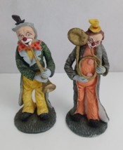 2 Vintage Resin Hobo Clown Playing Instrument 5.75&quot; - £13.23 GBP