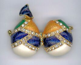 Multicolored Egg Pendant that opens with a hanging Angel inside and Crystal - $30.41