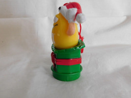 M Ms Yellow Coming out of Gift Box Ornament Topper 1998 - $3.99