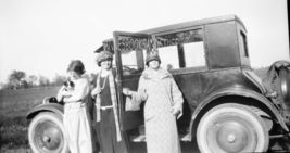 BLACK &amp; WHITE NEGATIVE * snapshot LADIES next to car one holding PUPPY l... - $9.95