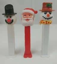 Vintage Lot of 3 Christmas Pez Dispensers Santa &amp; 2 Different Snowmen - $165.19 MXN