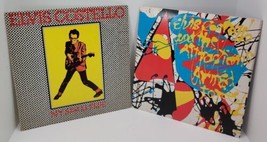 2 VTG Elvis Costello Vinyl Record LP Lot My Aim is True 35037 &amp; 35709 Attraction - £21.64 GBP