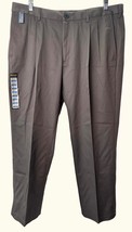 Haggar Classic Fit Khaki Pants Pleated Stretch Fabric Waist Size 38X29 D... - $35.99