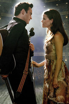 Joaquin Phoenix as Johnny Cash Reese Witherspoon as June Carter on stage... - $23.99
