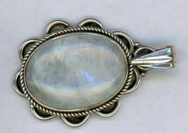 MOONSTONE Pendant mounted in Silver frame with a Decor design around the... - £27.06 GBP