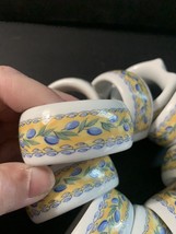 Vintage Set of 12 Ceramic Ring Style Napkin Holders Yellow Blue Summer S... - $16.75