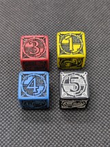 (4) Q Workshop (D6) Kingsburg Dice (1) Blue (1) White (1) Yellow (1) Black  - $811.10 MXN