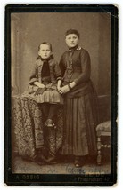 CIRCA 1870&#39;S CDV Two Young Women Youngest sitting On Table Ossig Heide, Germany - £8.94 GBP