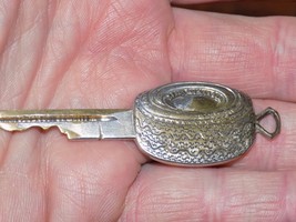 Vintage Tire Metal Car Key - $439.27 MXN