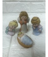 Vintage Set Of 4 Porcelain Bisque Christmas Angels Praying Baby Jesus Na... - $38.84 CAD