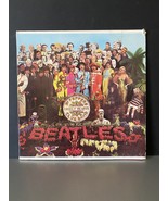   Vinyl Record The Beatles Sgt. Peppers Lonely Hearts Club Band 1967 In VGC - $119.23 CAD