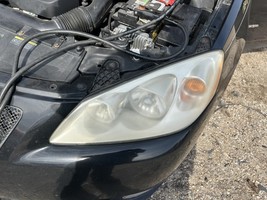 Driver Left Headlight Amber Lens Fits 05-09 G6 104807703 - $93.21
