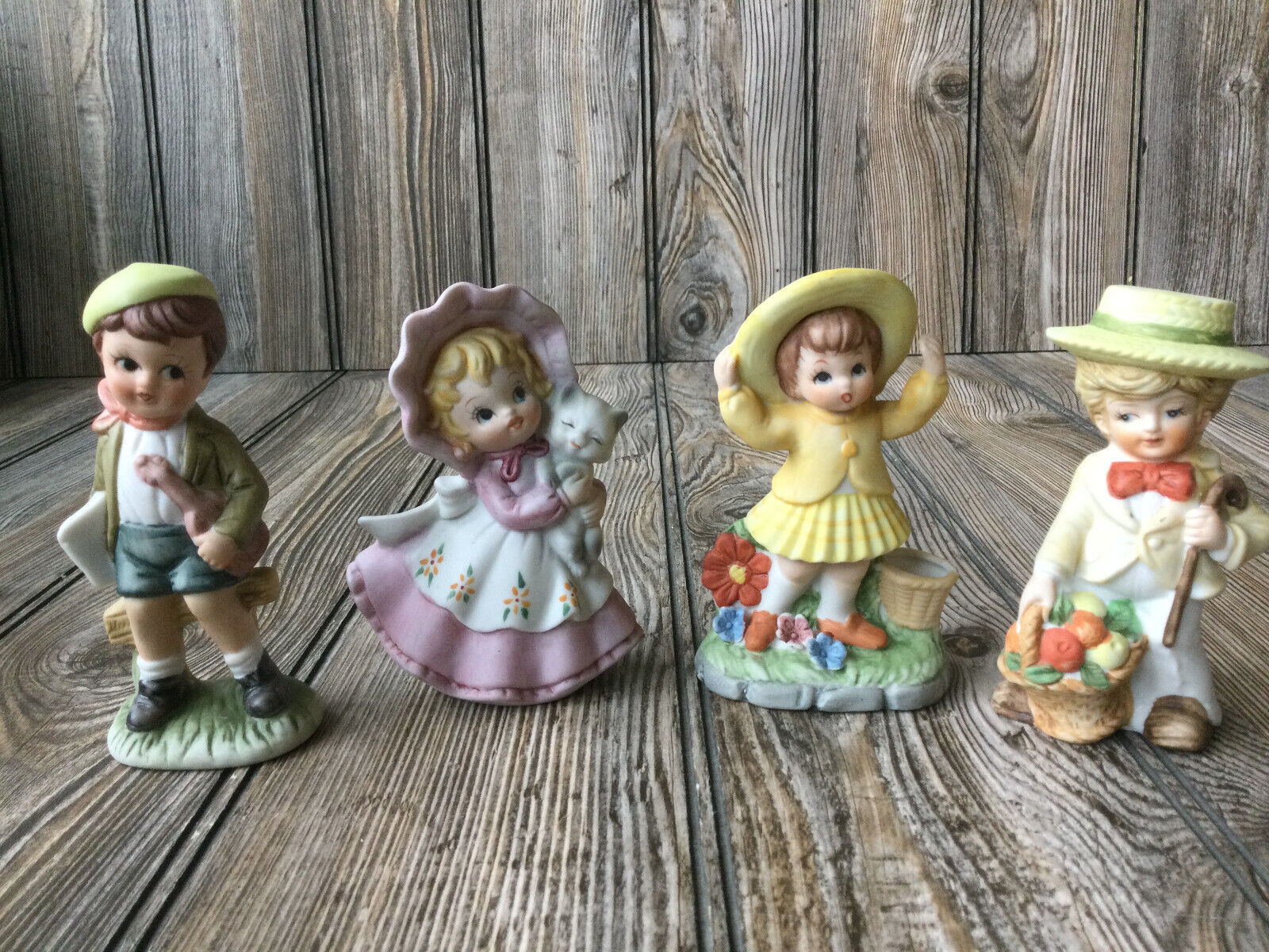 Primary image for Lot of 4 Vintage Porcelain Boys & Girls Figurines Enesco?