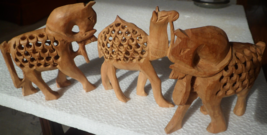 HAND CARVED HORSES AND CAMEL WITH OFFSPRINGS INSIDE. SOUTH ASIA. - $49.00