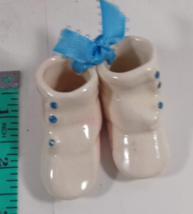 pair of old fashion baby booties minature glass blue ribbon - £4.64 GBP