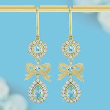 Natural Blue Topaz and Diamond Vintage Style Ribbon Earrings in 9K Yellow Gold - £1,879.53 GBP