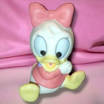 WALT DISNEY DAISY DUCK&#39;S NIECE APRIL PORCELAIN FIGURE 2-1/4&quot; - $204.33 MXN