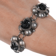 7&quot; 1940&#39;s Mexican silver molded glass masks bracelet - £101.29 GBP