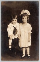 RPPC Cute Children Gwendolyn Large Hair Bow &amp; Funny Face Brother Postcard M21 - £6.45 GBP