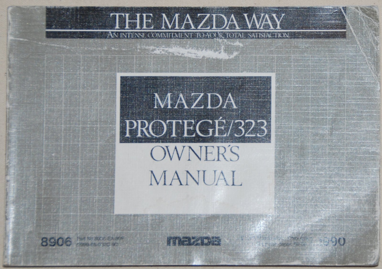 1990 Mazda Protege, 323 Owners Manual [Paperback] Mazda - $18.60