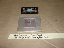 OEM 84 Cadillac Deville RWD Door Panel Courtesy Light Lens Cover w/ Crest Emblem - £27.37 GBP