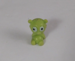 Vintage Relaxing Green Wide Eyed Bear Cub .75&quot; Vending Machine Toy Figure - $5.93