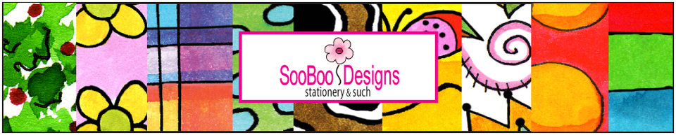 A welcome banner for SooBoo Designs' booth