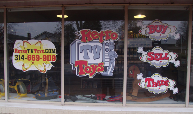A welcome banner for Retro TV Toys' booth