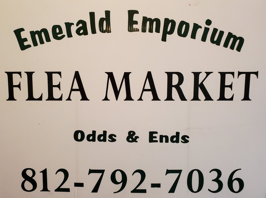 A welcome banner for Emerald Emporium Flea Market