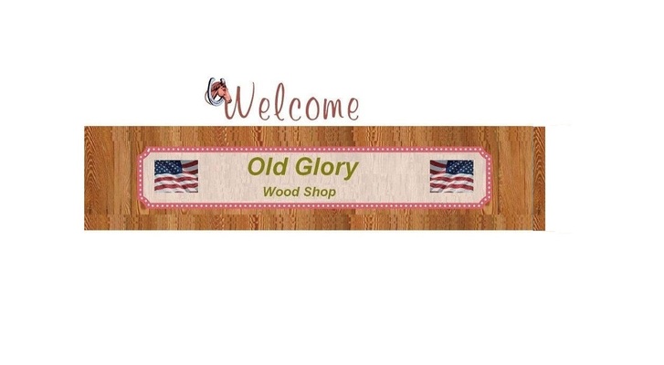 A welcome banner for old glory wood shop