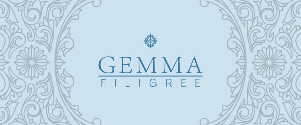 A welcome banner for GEMMA Filigree Jewelry's booth