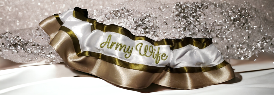 A welcome banner for Kansas Elf's Wedding Garter Booth