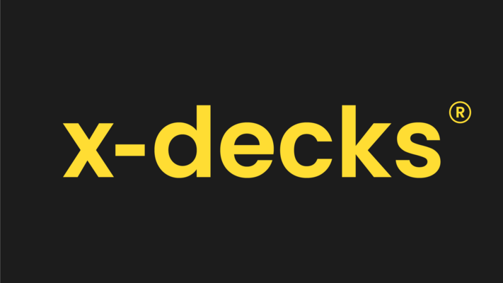 A welcome banner for X_Decks's booth