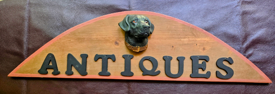 A welcome banner for Black Labrador Antiques & Collectibles
