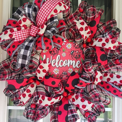 A welcome banner for WreathsByJamiCo
